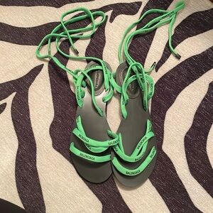 Green Balenciaga sandals that tie up the ankle